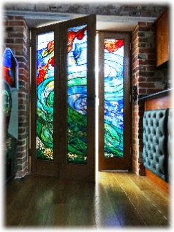 Cross Mill Winchester Games Room stained glass windows to the entrance